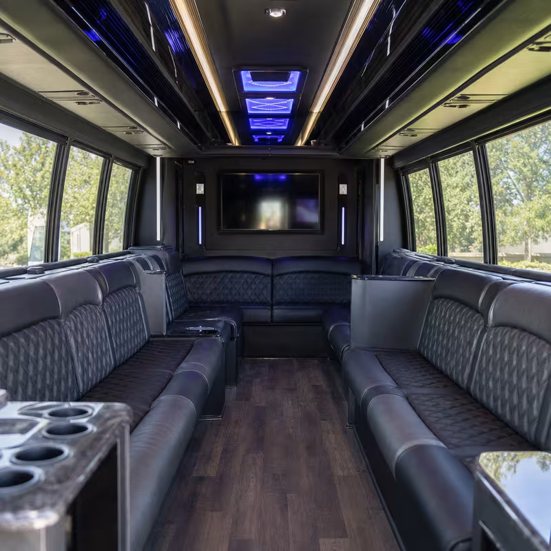 Passenger watching the Kansas City scenery during a regional party bus road trip
